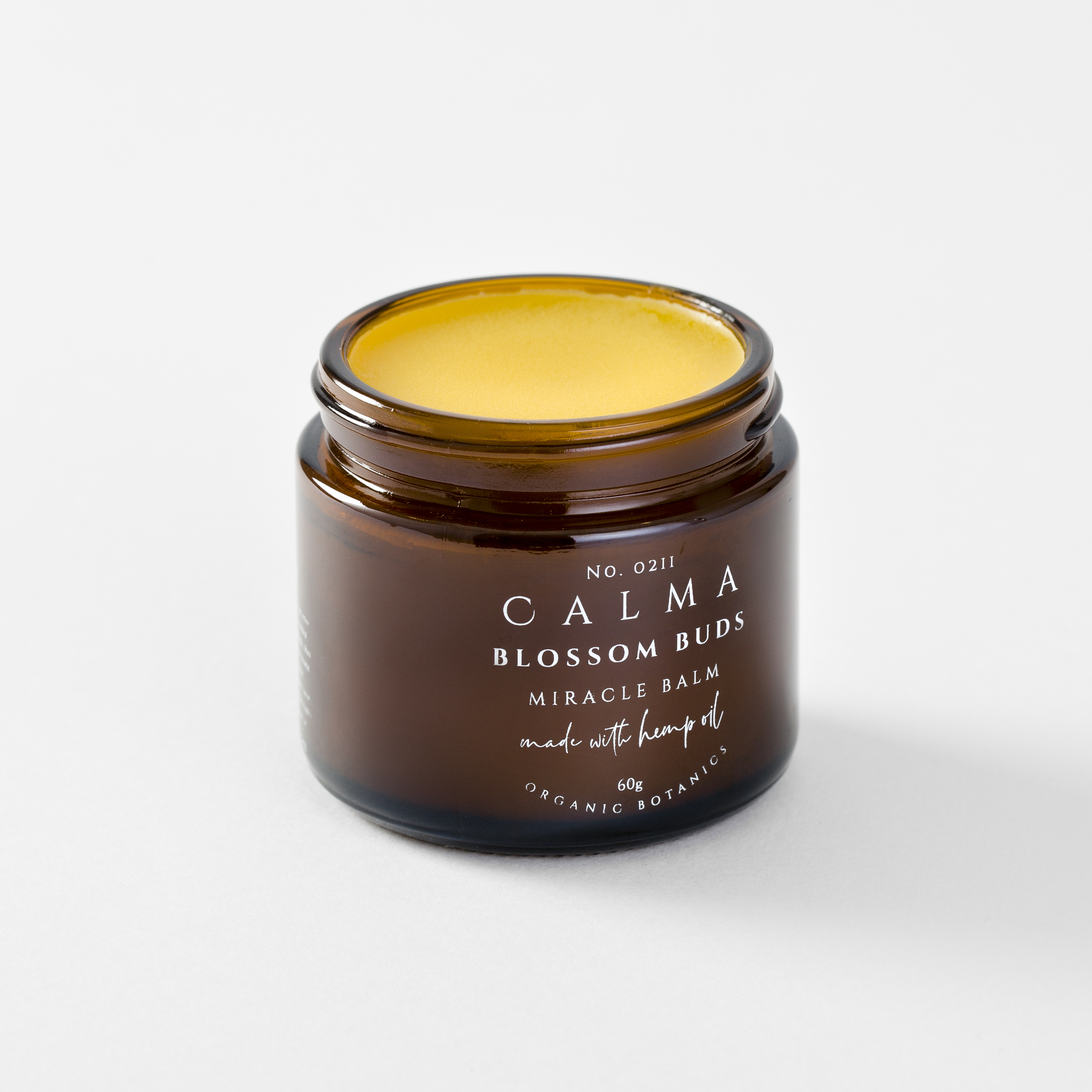 amber jar skincare product photography